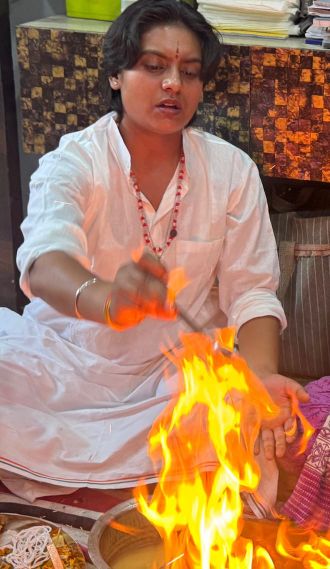 Guruji during a sacred fire ritual